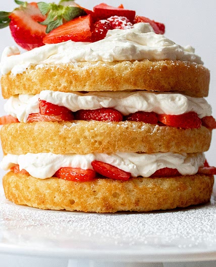 Vanilla Cake with Strawberries and Whipped Cream