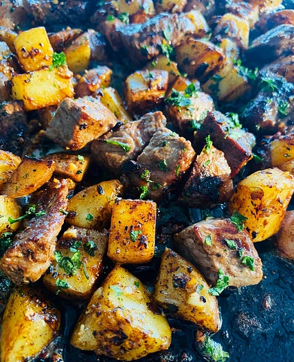 Blackstone Garlic Steak Bites and Potatoes