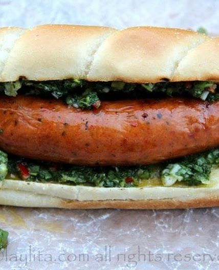 Choripan or chorizo hot dog with chimichurri sauce