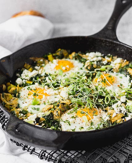 Green Shakshuka with Kale, Leeks, Artichokes, & Feta