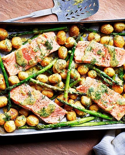 Sea trout, new potato and asparagus traybake with dill mustard sauce