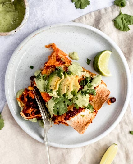Sweet Potato Black Bean Enchiladas with Avocado Lime Crema