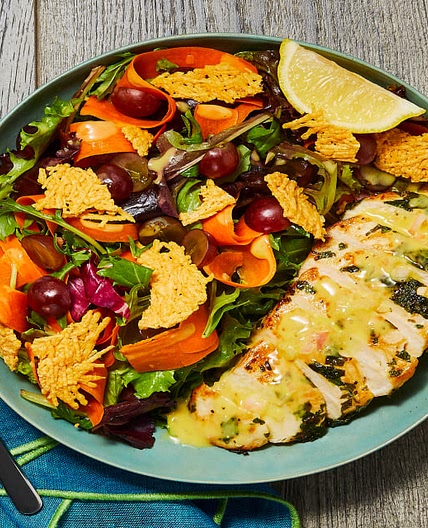 Garlic Herb Chicken with Grape Frico Salad and Honey Dijon–Shallot Dressing