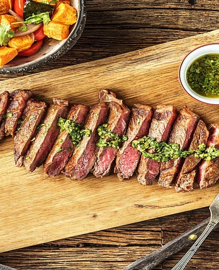 Argentine Chimichurri Steak with a Sweet Potato, Poblano, and Tomato Jumble
