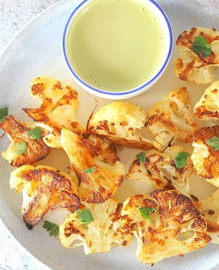 Roasted Cauliflower with Tahini Cilantro Dressing