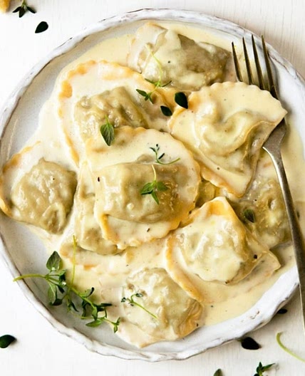 Mushroom Ravioli In A Parmesan Cream Sauce