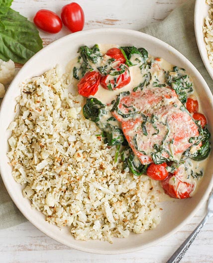 Salmon with Cauliflower Rice, Spinach, Tomatoes & Creamy Basil Sauce