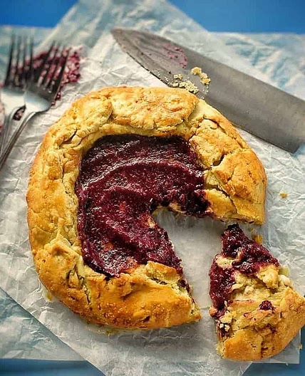 Whipped feta, onion and spicy blueberry chutney galette