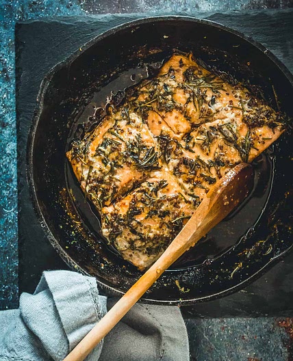 Cast-iron pan fried sockeye salmon with mustard, honey and wild herbs