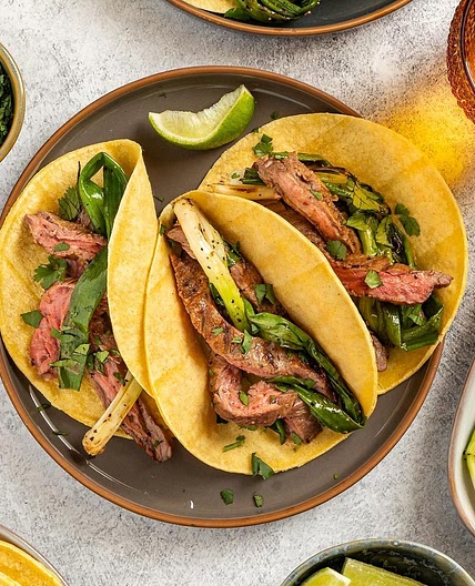 Grilled Onion & Skirt Steak Tacos