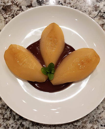 Poached pears with chocolate sauce