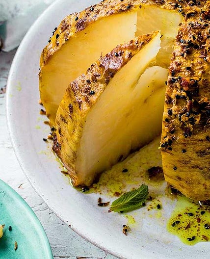 Slow-roast spiced whole celeriac with raita