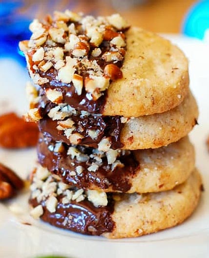 Chocolate dipped pecan shortbread cookies