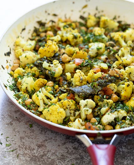 Cauliflower Chickpeas and Spinach in Mustard seed Curry Leaf Sauce