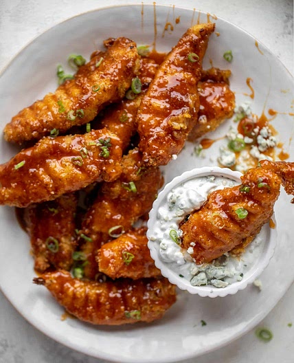 Sticky Chicken Fingers with Yogurt Blue Cheese Sauce