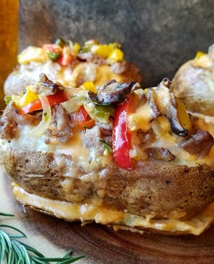 Twice Baked Philly Cheesesteak Potatoes with Homemade Whiz
