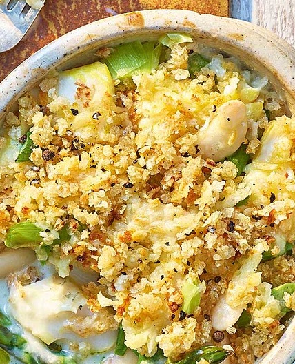 Smoked haddock, asparagus and bean gratin