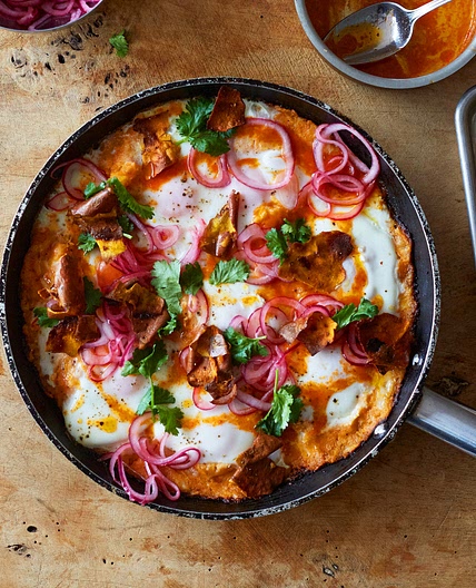 Sweet potato shakshuka with sriracha butter and pickled onions
