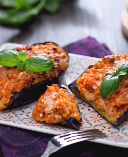 Melanzane ripiene di riso con cuore filante