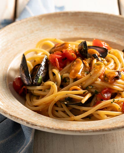 Spaghetti con cozze e pomodorini