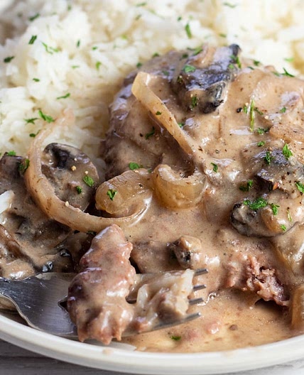 Crockpot Cube Steak Recipe (with gravy, onions, and mushrooms)