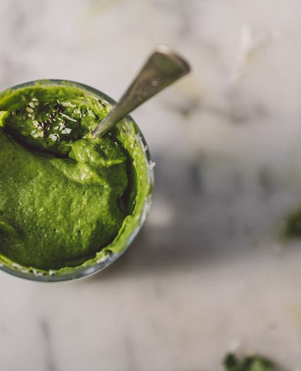 A vibrant avocado smoothie plus groceries for glowing skin