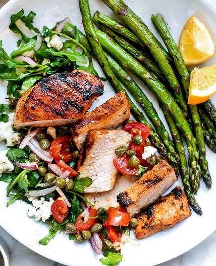 Mediterranean Grilled Pork Chops with Tomato Salad