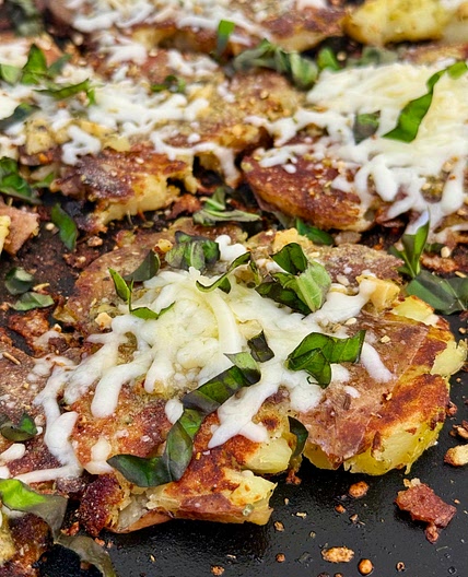 Blackstone Cheesy Pesto Smashed Potatoes