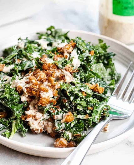 Kale Tahini Caesar Salad with Harissa Roasted Chickpeas