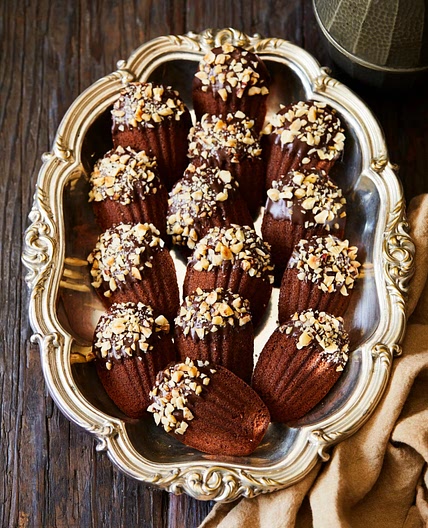 Chocolate madeleines with hazelnuts
