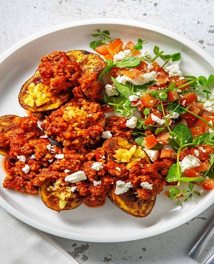 Greek Inspired Lamb Ragu Jacky-P with Tomato and Pea Shoot Salad
