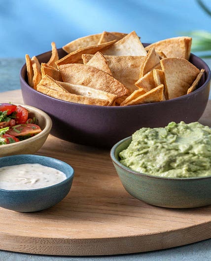 Homemade Tortilla Chips and Dips with Tomato Salsa, Zesty Soured Cream and Guac | Perfect for Sharing