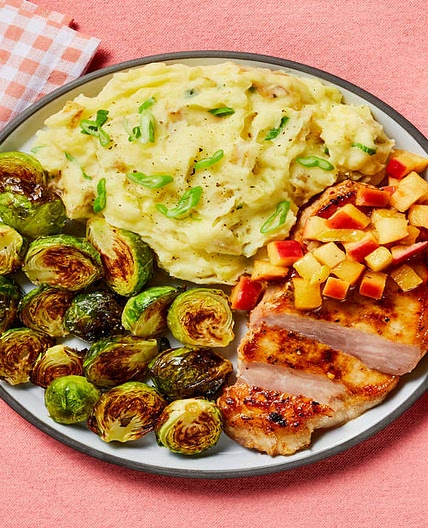 Brown Sugar Bourbon Pork Chops with Apple Pan Sauce, Scallion Mashed Potatoes & Brussels Sprouts