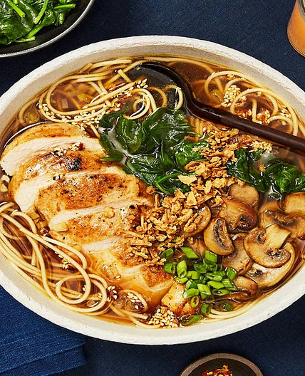 Chicken Ramen in a Shoyu-Style Broth with Mushrooms, Chili Garlic Oil & Crispy Onions
