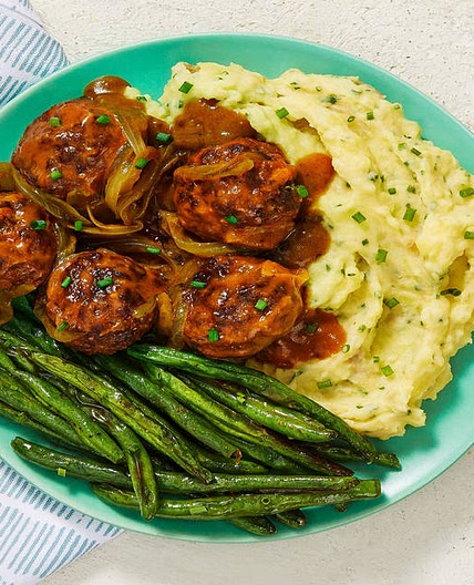 Gravy-Smothered Meatballs over Chive Mashed Potatoes with Roasted Green Beans