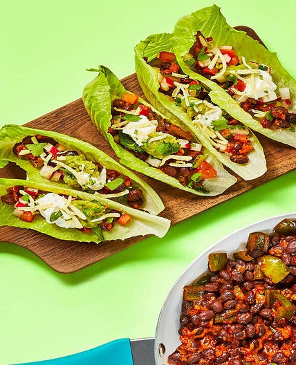 One-Pan Bean & Poblano Lettuce Wraps with Radish Tomato Salsa, Cheese & Guacamole