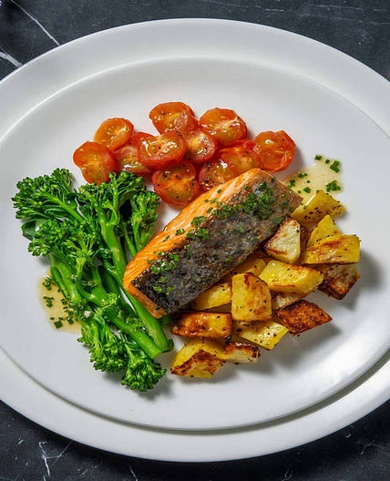 Pan-Seared Salmon and Chive Butter with Roast Potatoes, Tomatoes and Tenderstem® Broccoli