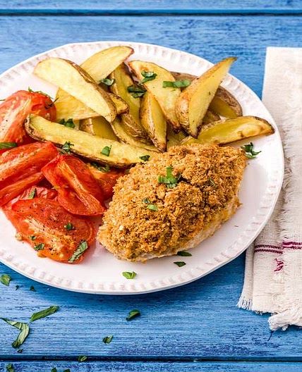 Mozzarella-Crusted Chicken with Blistered Tomatoes and Potato Wedges