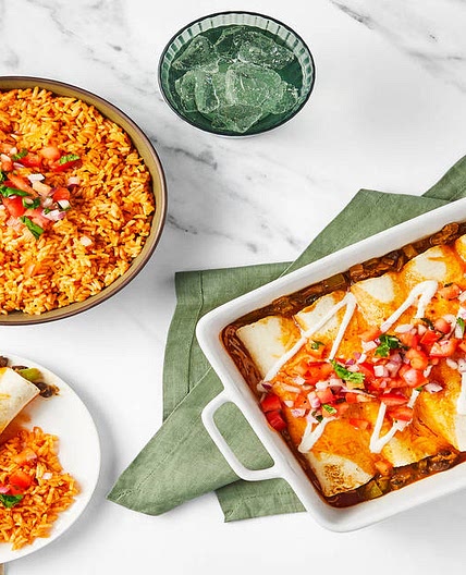 David Burtka’s Cheesy Chicken & Bean Enchiladas with Tomato Rice, Pico de Gallo & Lime Crema