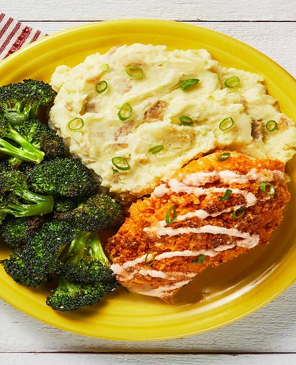 Crispy Kickin' Cayenne Chicken Cutlets with Monterey Jack, Mashed Potatoes, Buttery Broccoli & a Honey Drizzle