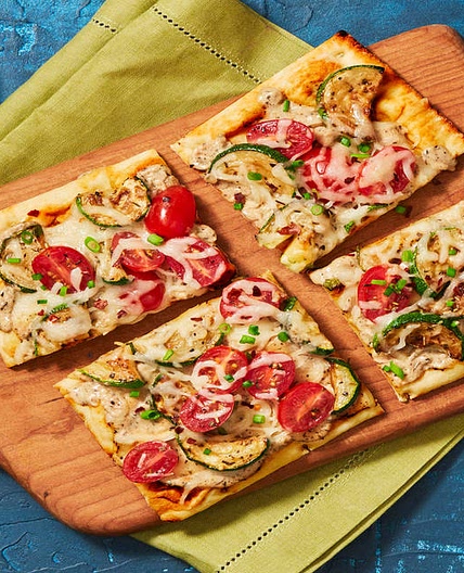 Roasted Garlic, Zucchini & Bacon Flatbreads with White Sauce, Mozzarella & Grape Tomatoes