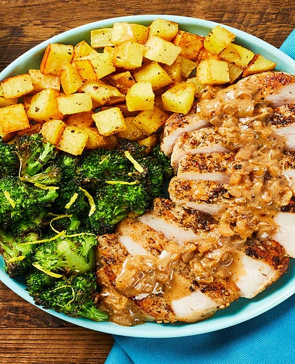 Steakhouse-Style Pork Chops with a Creamy Pan Sauce, Roasted Potatoes & Lemony Broccoli