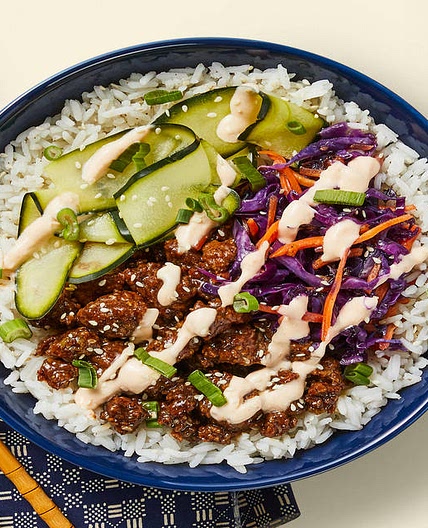 Beef Bulgogi Bowls with Pickled Cucumber & Sriracha Crema