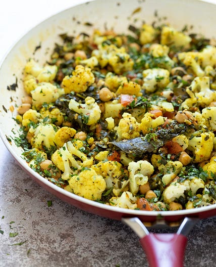 Cauliflower Chickpeas and Spinach in Mustard seed Curry Leaf Sauce
