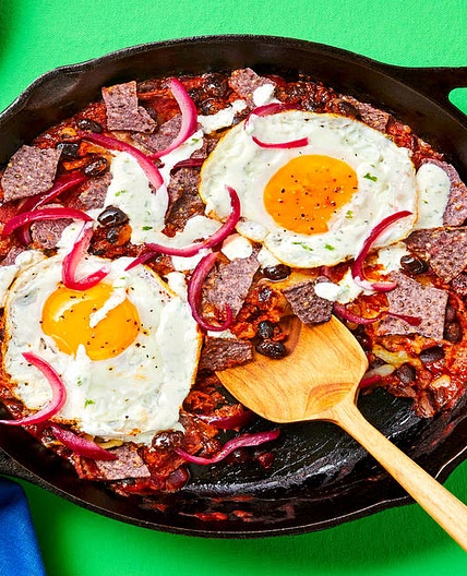 Blue Corn Tortilla Skillet with Eggs, Black Beans, Lime Crema, Pickled Onion & Pepper Jack