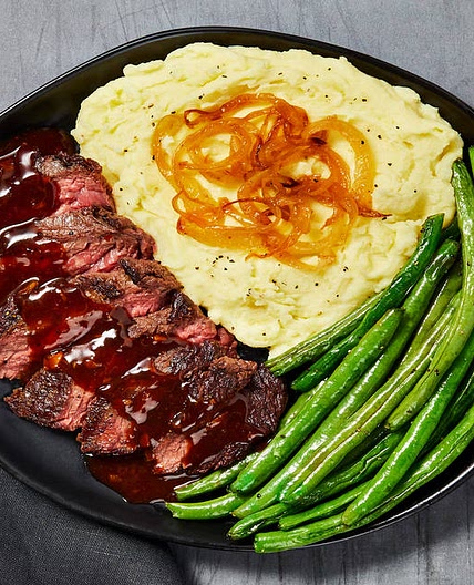 Bavette Steak in a Demi Glace Sauce with Caramelized Onion Mashed Potatoes & Roasted Green Beans