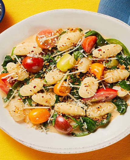 Gnocchi with Spinach & Tomatoes topped with Garlic Butter Breadcrumbs