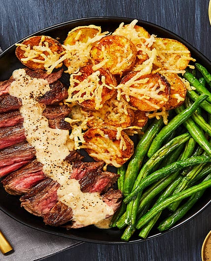 Bavette Steak & Sherry Shallot Sauce with Garlic Parmesan Potato Clusters & Roasted Green Beans