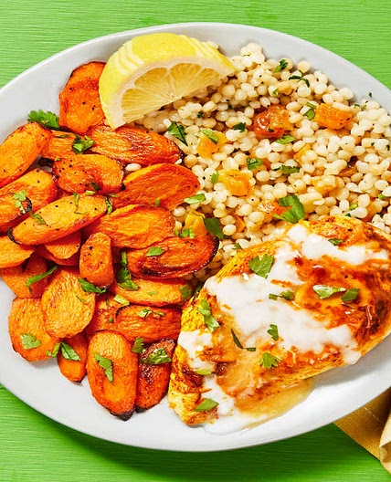 Citrus & Spice Marinated Chicken with Roasted Carrots, Apricot Cilantro Couscous & Garlic Yogurt Sauce