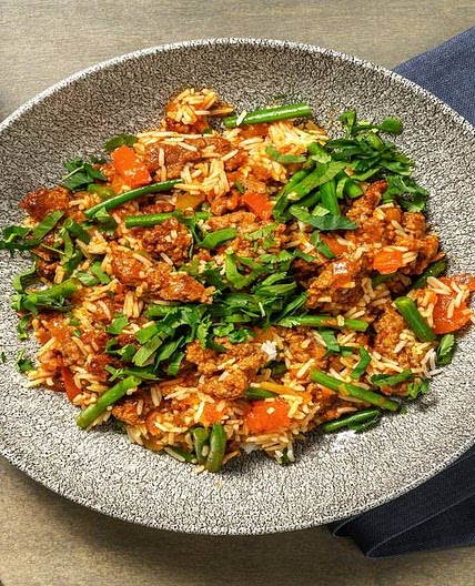 Aromatic Beef Pilaf with Tomatoes, Green Beans and Mango Chutney